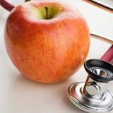 Apple A Day Health Foods logo